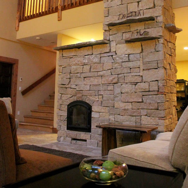 about the inn - stone fireplace